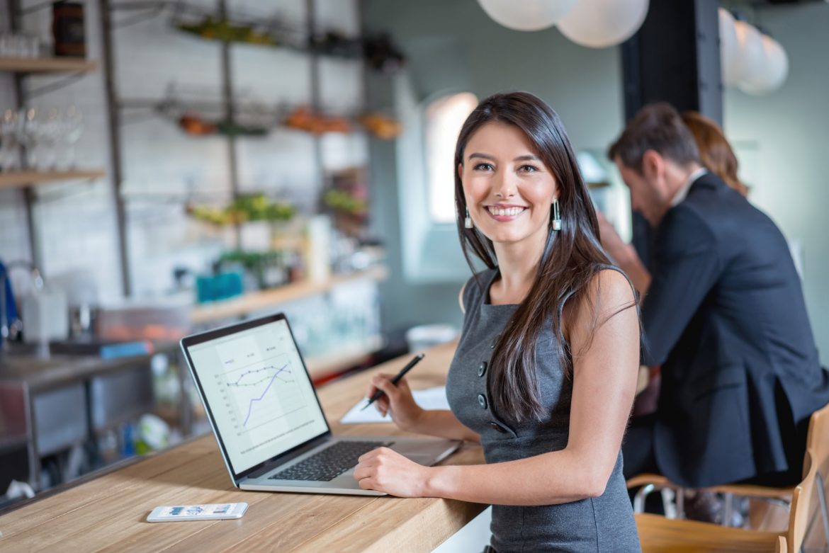Business woman working at a cafe
